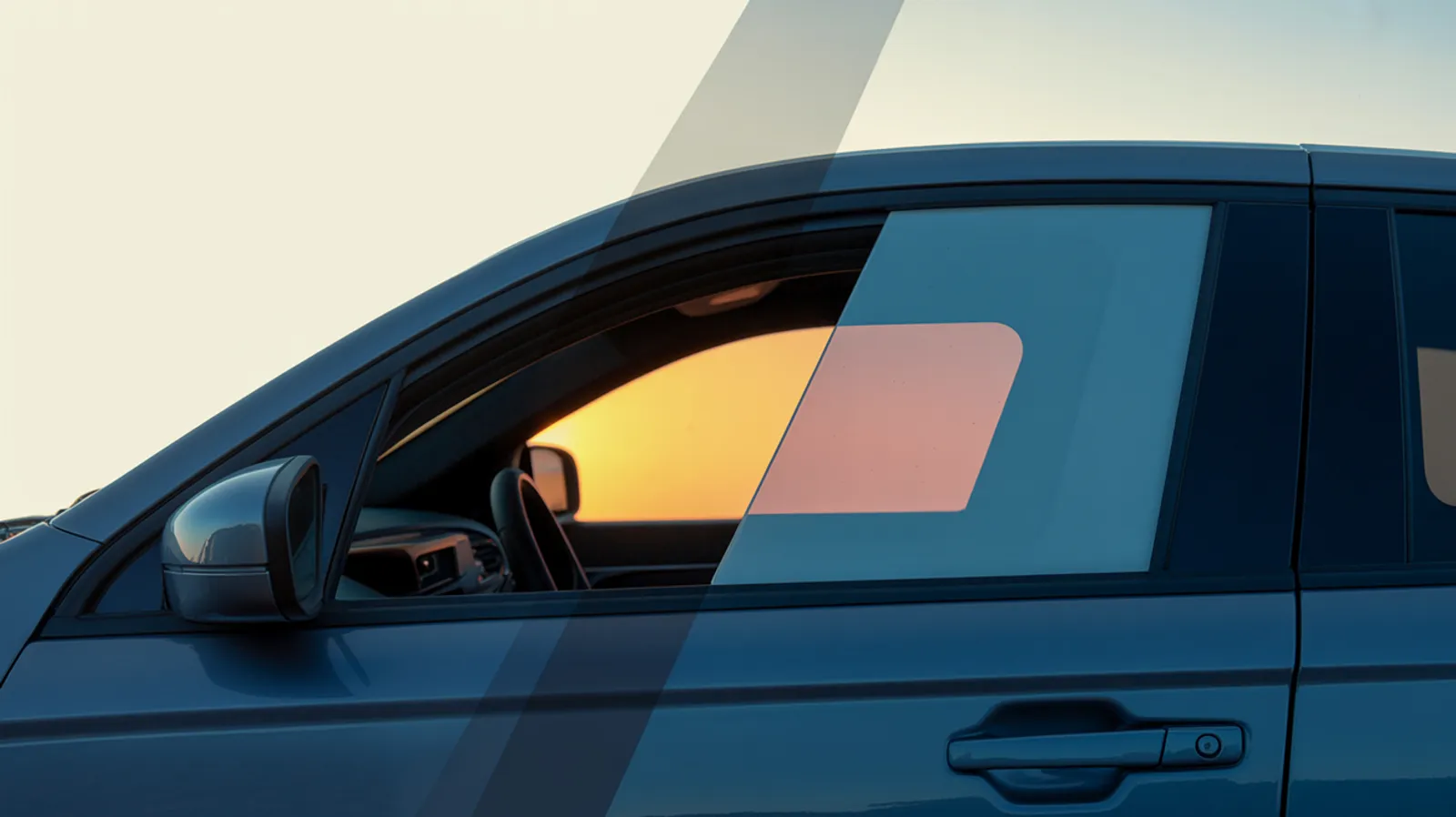 Two side window tint film samples held against bright desert sunlight for comparison